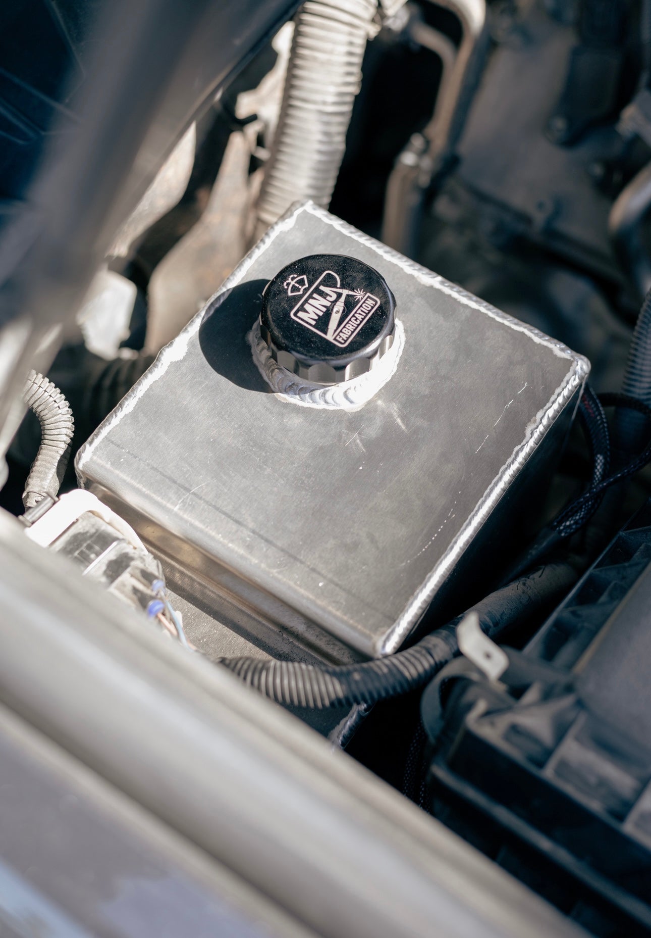 5th Gen Toyota 4Runner (2010–2023) Aluminum Washer Fluid Relocation Reservoir Kit