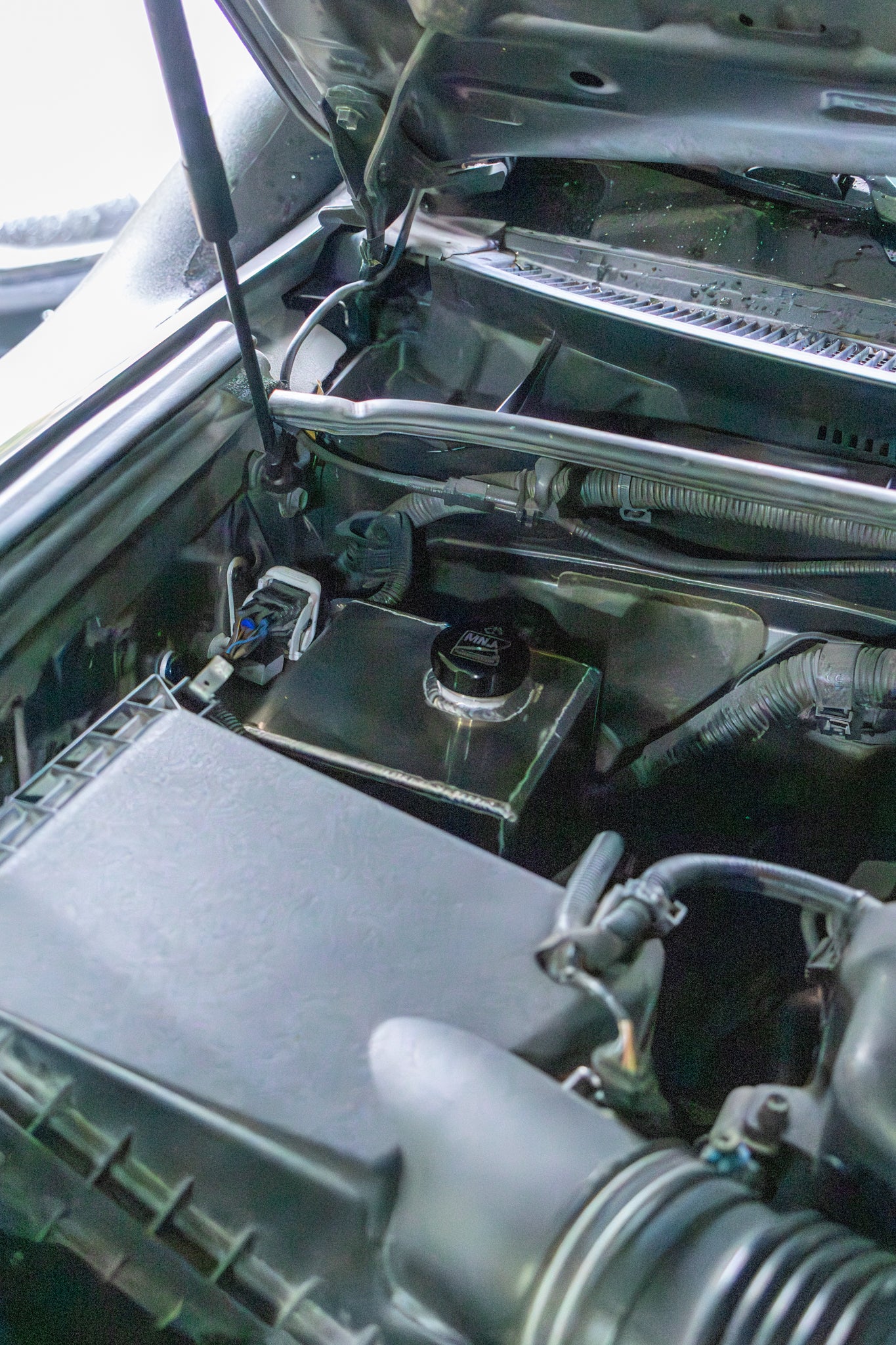 5th Gen Toyota 4Runner (2010–2023) Aluminum Washer Fluid Relocation Reservoir Kit (PRE-ORDER)