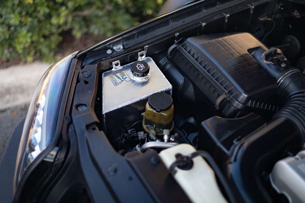 4th Gen Toyota 4Runner (2003–2009) Aluminum Washer Fluid Relocation Reservoir Kit (PRE-ORDER)